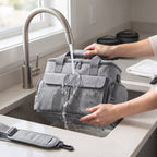 Gray dog travel bag shoulder strap detail