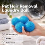 Laundry balls catching pet hair in a washing machine drum