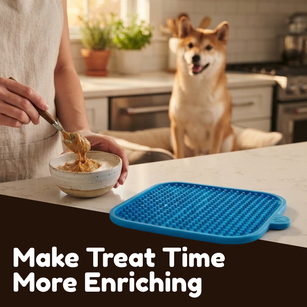 Dog lick mat suctioned to a bath during washing