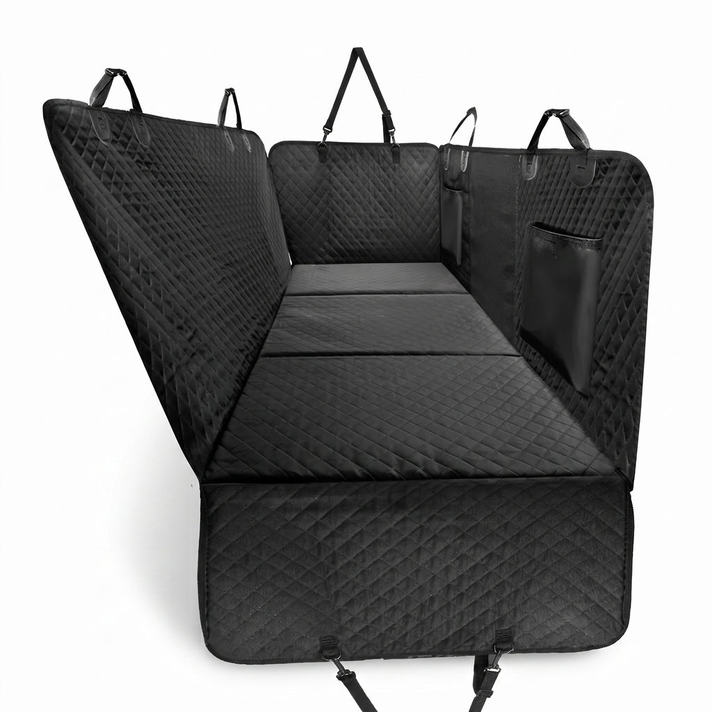 The full cover laid out, showing quilted panels, side flaps, storage pockets and headrest straps